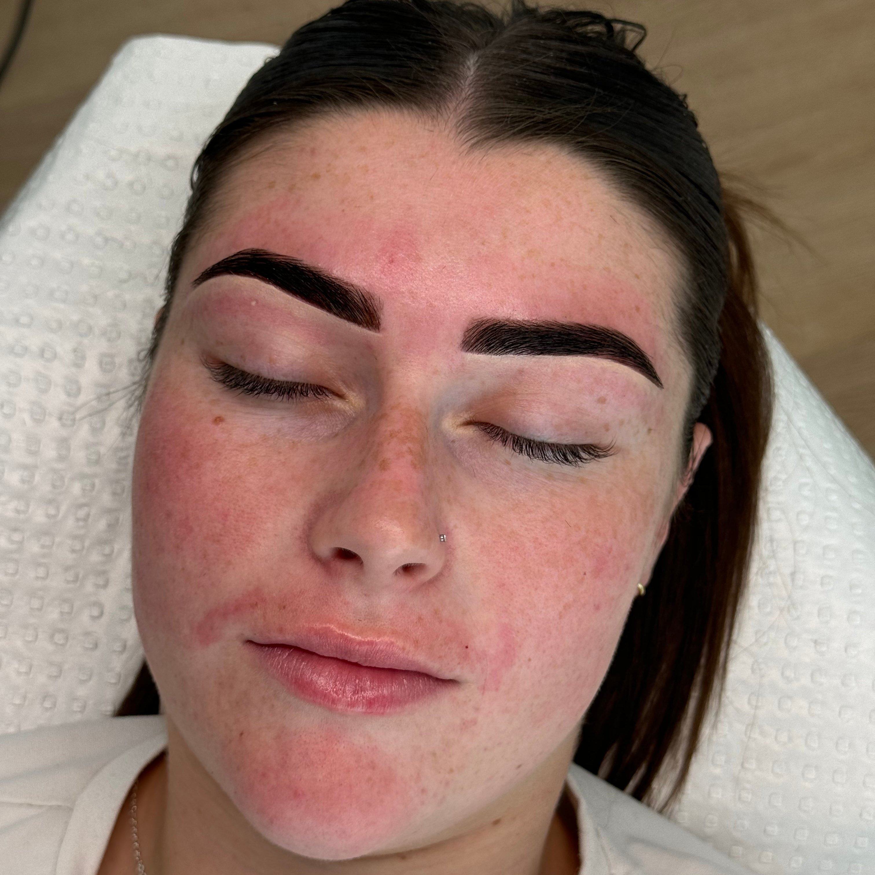 Close-up of freshly done hybrid brows, showcasing a professional brow sculpting and tinting technique taught at By Tarnee Morris in Penrith during advanced lash and brow training